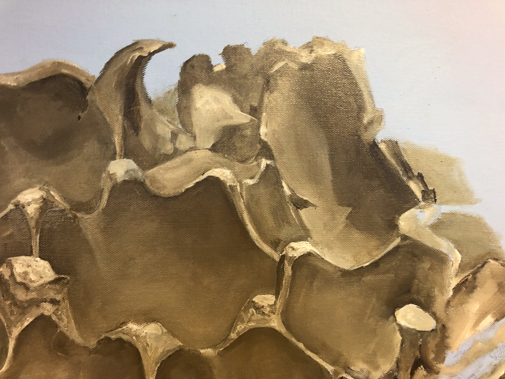 Close up of oils piece.